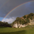 Rainbow_over_cliffs.jpg